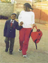 Lerato and Emmanuel walk to school
